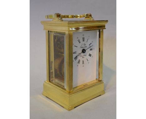 A Heavy Brass Carriage Clock, the enamel dial with Roman and Arabic numerals and with lever escapement, a/f
