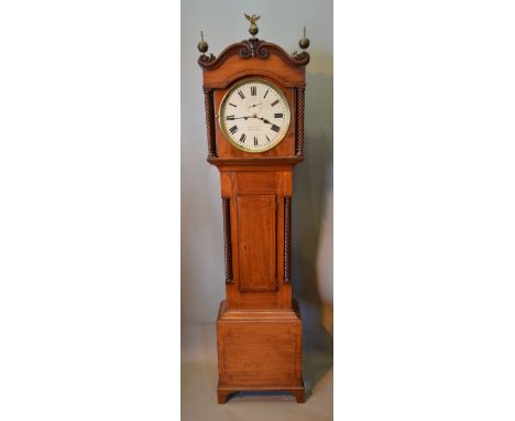 An Early 19th Century Mahogany and Chequerline Inlaid Long Case Clock, the shaped hood with spiral pilasters and three brass 