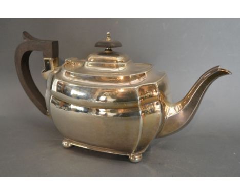 A Queen Elizabeth II Silver Teapot with Shaped Handle and Finial, Sheffield 1966, maker's mark R & D, 20 ozs all in