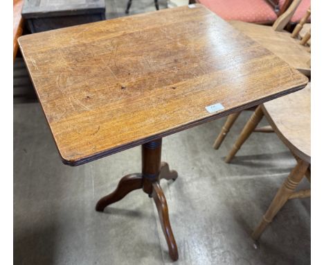 A Victorian mahogany tripod tea table 