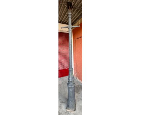 A Victorian style cast iron street lamp post 