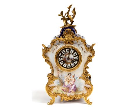 A late 19th Century ceramic bracket clock in the Rococo Revival style, circa 1890, of bombe form, gilt metal scrol mounts, th