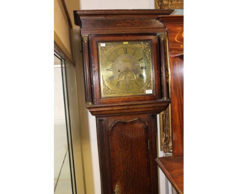 A George III oak eight day longcase clock, having a brass dial and black Roman numerals, the 12 inch dial inscribed 'Foden, C