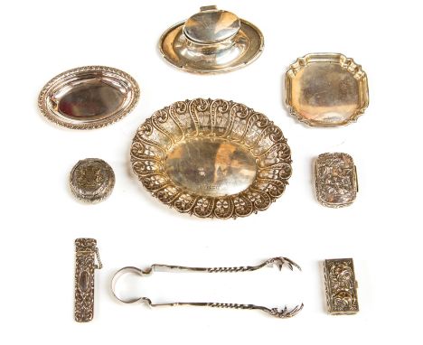 A collection of silver including: A George V oval inkwell, A J Zimmerman, Birmingham, 1915An Edwardian oval pin tray, J Rose,