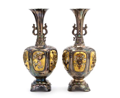 A pair of Japanese silver, Shibayama and enamelled vases, Meiji, ovoid form with flared necks and cast dragon handles, each w