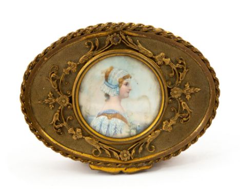 A late 19th Century French gilt metal oval jewel box, the cover inset with a roundel portrait of a young lady in profile, on 