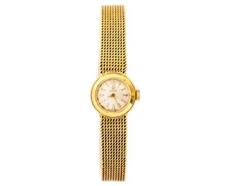 Omega, a lady's 18ct gold Omega wristwatch, 1.5cm circular dial, integral 18ct gold textured strap, approximate weight all in