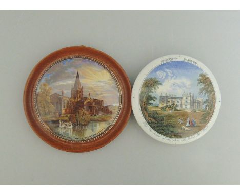 Two Staffordshire Prattware polychrome pot lids, one mounted in a light wooden frame, titled  'Drayton Manor'  and 'Church of