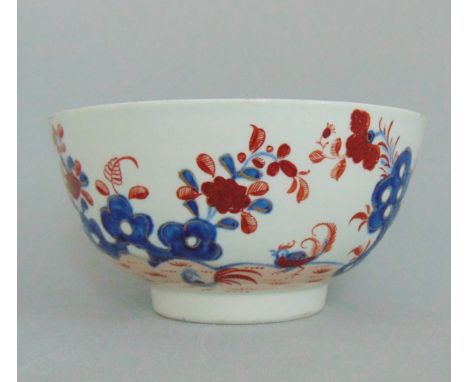 A Lowestoft small bowl painted  with the 'Two Bird' pattern  in underglaze blue, iron red and gilt highlights, circa 1780, 11