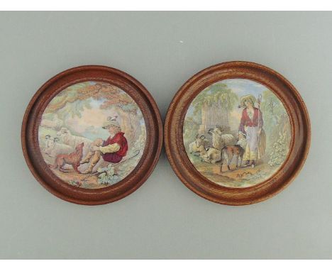 Two Staffordshire Prattware polychrome pot lids, mounted in light wooden frames, titled  'The Shepherd  Boy' and 'The Shepher