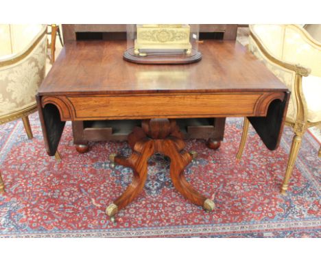 An early 19th Century rosewood pedestal sofa table, fitted with a single frieze drawer, 71cm high, 93cm wide, 69cm deep