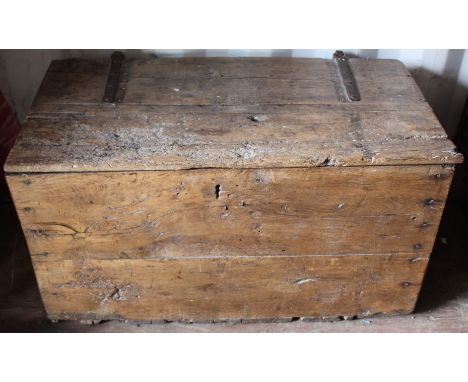 An 18th Century elm plank trunk, the hinged lid secured on wrought iron hinges and opening to reveal storage section, 58cm hi