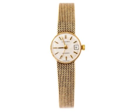 Longines, a 1970's lady's 9ct gold Longines Automatic wristwatch, 2cm circular silvered dial, baton hands and numerals, date 