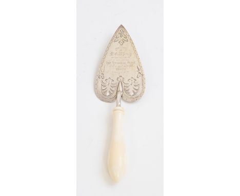 A Victorian silver presentation trowel, the blade engraved with geometric pattern surrounding presentation inscription: PRESE