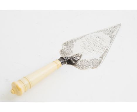 An Edwardian silver bright-cut engraved presentation trowel, turned ivory handle, the body with inscription: PRESENTED TO J B