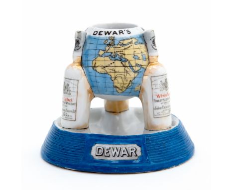 A vintage Dewar Whisky advertising ceramic match striker