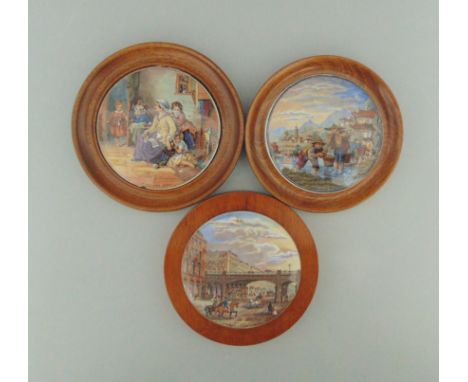 Three Staffordshire Prattware polychrome pot lids mounted in light wooden frames, titled 'Hide & Seek', 'Transplanting Rice' 