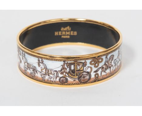 HERMES enamel bangle, featuring a horse and carriage, gold tone border, width approx 1.9cm with an inner diameter of approx 6