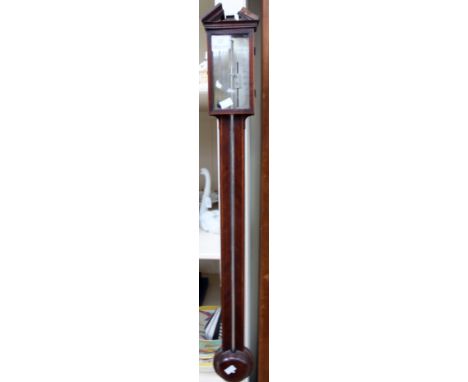 A Georgian mahogany stick barometer, mercury with a spirit thermometer, some damage to wood 