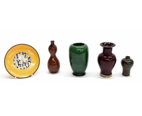 Four small Oriental monochrome glazed vases, tallest 5" high; together with a small Chinese enamel on copper dish, decorated 