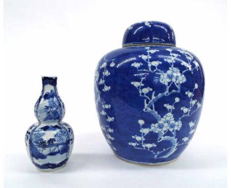 Chinese Kangxi style blue and white porcelain double gourd vase painted with panels of landscapes and animals, 6.25" high; to