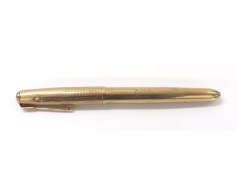Parker 9ct fountain pen, with engine turned decoration, monogrammed 'R.H.R', 28.1gm, 5.75" long