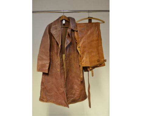 An early 20th century flying coat, full length, light brown leather, blanket lined, with belt, together with a pair of leathe