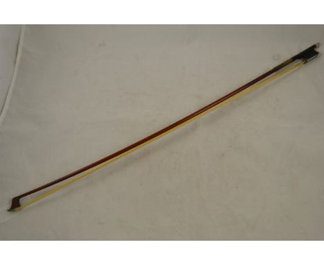 A violin bow, the stick round, ebony frog with mother of pearl to underside, approx weight 56g (with hair) - length 74.5cm CO