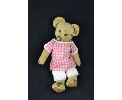A vintage teddy with black eyes, pointed snout and jointed body - H31cm CONDITION REPORT: No mohair very play worn