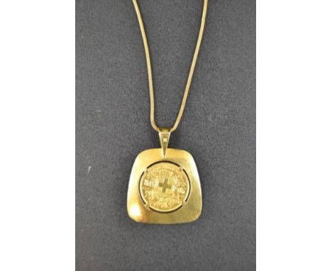 A Swiss 1935 gold 20 franc coin mounted in .750 pendant and necklace chain - approx total weight 23.1g CONDITION REPORT: good