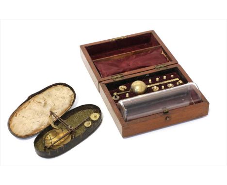 A mahogany cased hydrometer, by Sikes, 19th century, containing a glass phial, brass float and five of the original weights, 