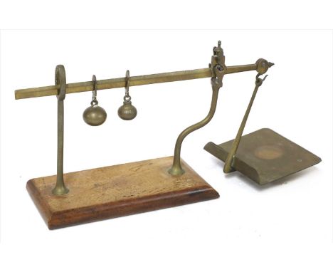 A set of large brass postal scales, late 19th century, the letter pan stamped 'H Pooley &amp; Son for Fennels of Manchester',