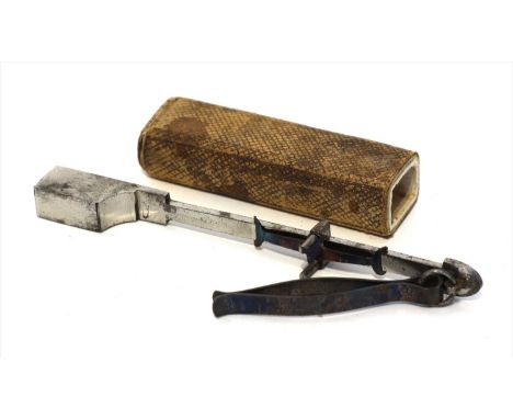 A steel shelf edge postal bismar, c.1870, by Thornhill Lond, stamped with a crown between 'VR', 11cm long