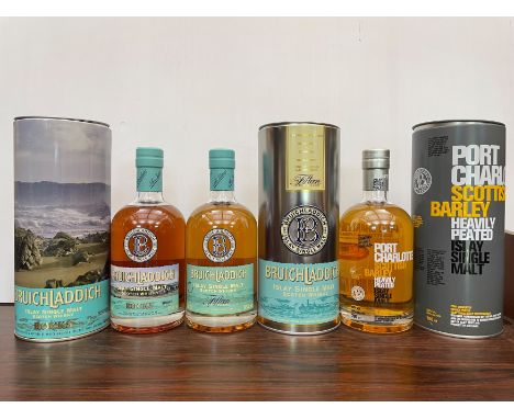 Bruichladdich Islay Single Malt Scotch Whisky, 3 bottles: Rocks, bottle dated Nov. '05, 70cl, 46%, with tin; the other aged 1