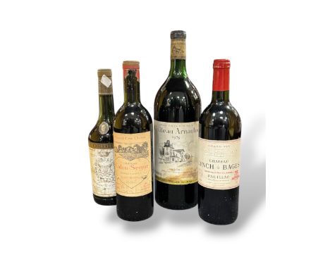 Four Bordeaux red wines: Chateau Calon-Segur, Saint-Estephe 1962, level near top shoulder; Chateau Gruaud-Larose, Saint Julie