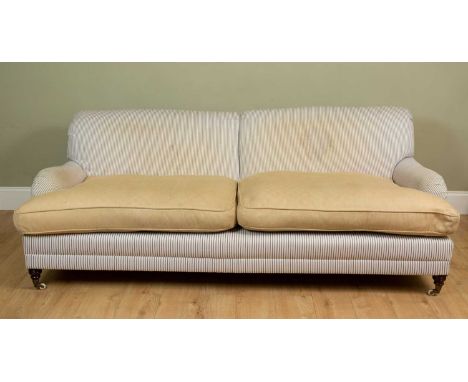 A large modern Howard-style Country House sofa with turned front legs and ceramic casters, approximately 220cm long x 107cm d