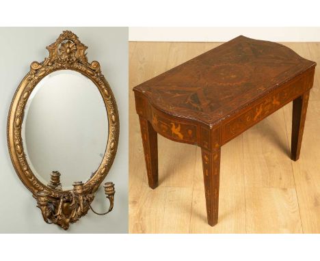 A 19th century gilt oval girandole mirror with three candle sconces and moulded gesso decoration to the frame, 44cm wide x 75