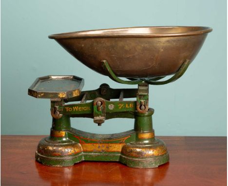 A Jones Bros green painted set of weighing scales and dish, inscribed '46 Park St, Luton'Used condition.