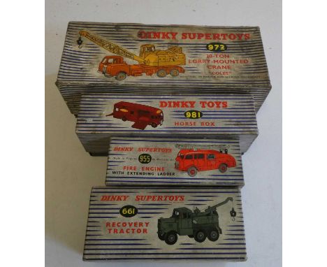 Four boxed Dinky vehicles comprising 981 Horsebox, 955 Fire engine, 661 Recovery tractor and 972 Coles crane, boxes poor, mod