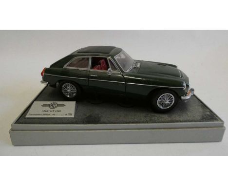 Heritage Motor Centre 1:18th scale model MGC GT 1969 finished in British Racing green, very dusty from having been on display