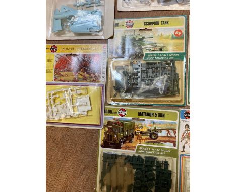 Seventeen Airfix carded 1/72nd scale and 54mm kits including military figures, aircraft and military vehicles, all items in g