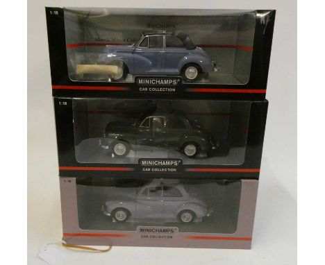 Three Mini Champs 1/18th scale Morris Minors comprising Morris Traveller and police car, and a London taxi cab, all items box