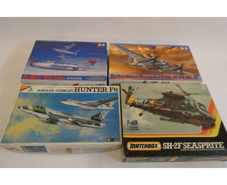 Four 148th scale model aircraft kits comprising Tamiya De Havilland Mosquito, Tamiya Russian Mig 15 BIS, clear edition, Match