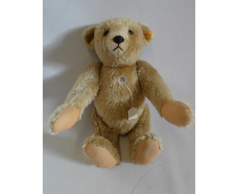 Steiff 1906 Classic teddy bear, with black button eyes, felt pads, card label to body, ear button and fabric label, 22" tallC