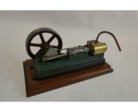 Stuart Turner S50 non-reversing single cylinder horizontal mill engine mounted on wooden base, a well-made free running engin