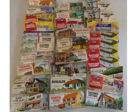 Thirty vintage bagged Airfix OO/HO scale line-side railway kits including buildings, trackside equipment and accessories, six