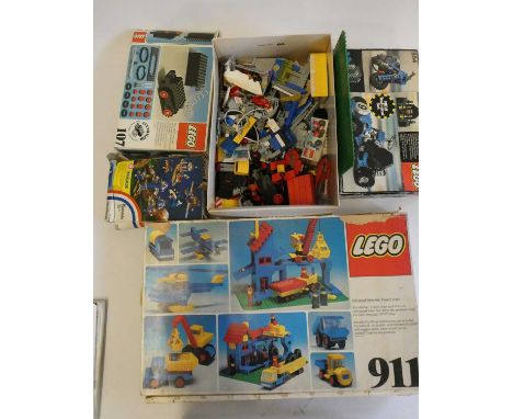 A box of vintage Lego, including sets 854, 107, 911 and other loose parts, completeness unchecked, all used
