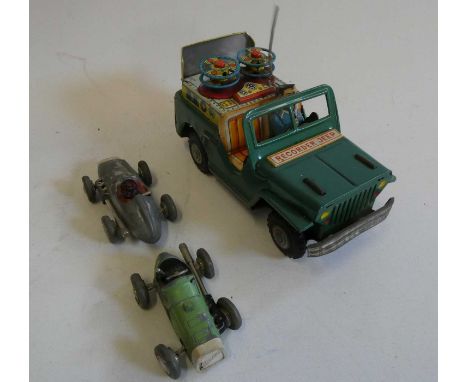 Tinplate friction powered recorder Jeep, driver’s hat is missing, and two Schuco Micro Races, paint damaged, both items fair