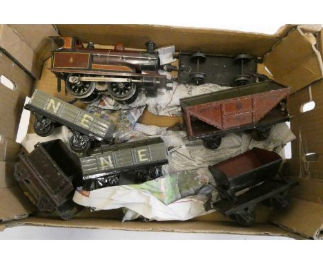 Marklin electric locomotive, tender missing and five Marklin goods wagons, fair