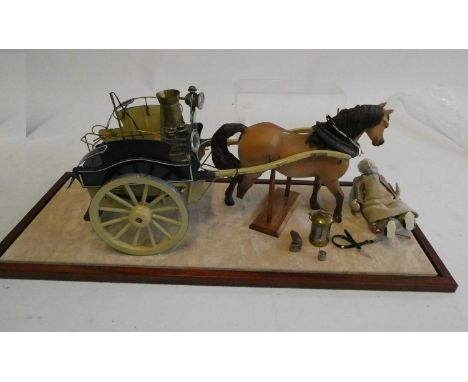 Approximately 1:8. Scale Model of horse drawn milk cart with horse and driver, in glass case, horse has one back foot broken 